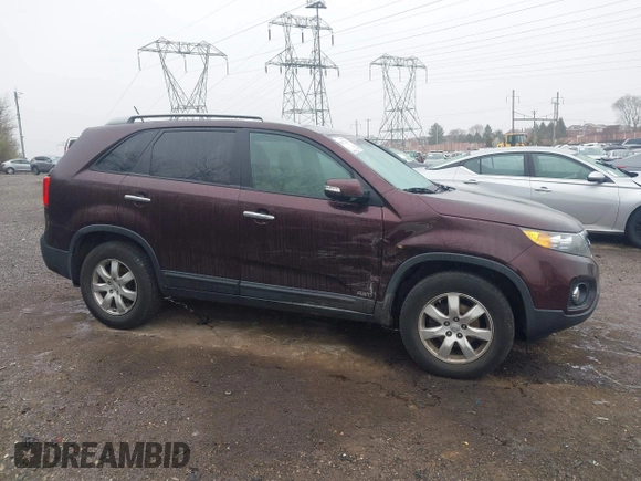 2012 Kia Sorento LX with VIN 5XYKTDA68CG303939, listed as a IAAI auction lot 41917791 with 211,086 mi miles. Bid and sale history available at carsss.com. Image 6.