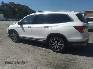 2019 Honda Pilot Touring 8-Passenger with VIN 5FNYF5H91KB038679, listed as a IAAI auction lot 40200012 with 70,582 mi miles. Bid and sale history available at carsss.com. Image 14.