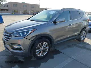 2017 Hyundai Santa Fe Sport 2.0T with VIN 5XYZU4LA7HG406516, listed as a IAAI auction lot 41847977 with 105,299 mi miles. Bid and sale history available at carsss.com. Image 17.
