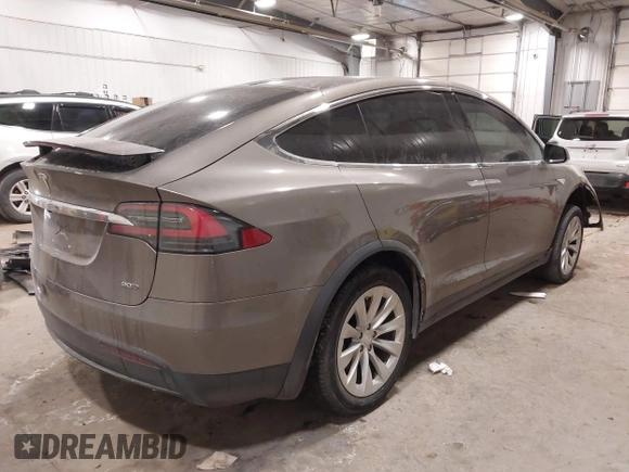 2016 Tesla Model X 70D with VIN 5YJXCBE27GF004974, listed as a IAAI auction lot 41630556 with 167,709 mi miles. Bid and sale history available at carsss.com. Image 4.