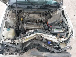 1997 Geo Prizm LSi with VIN 1Y1SK5266VZ417087, listed as a IAAI auction lot 42009913 with 198,041 mi miles. Bid and sale history available at carsss.com. Image 6.