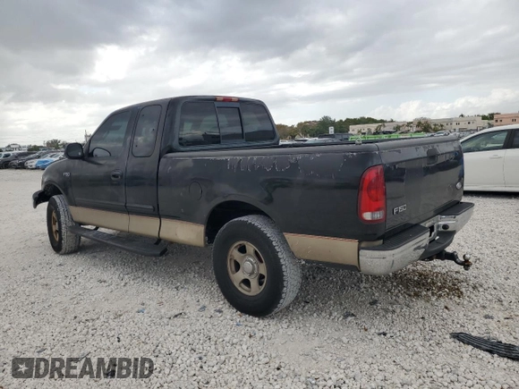 2000 Ford F-150 XL with VIN 1FTZX1721YNC09536, listed as a Copart auction lot 52645405 with 120,638 mi miles and Salvage Title. Bid and sale history available at carsss.com. Image 2.