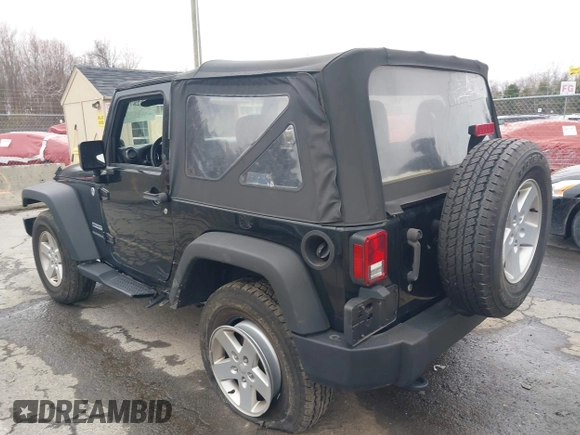 2014 Jeep Wrangler Sport with VIN 1C4AJWAG9EL312856, listed as a IAAI auction lot 42022870 with 98,323 mi miles and . Bid and sale history available at DreamBid. Image 3.