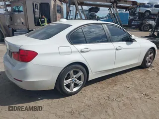 2015 BMW 3 Series 320i xDrive with VIN WBA3C3C58FK201748, listed as a IAAI auction lot 42678404 with 115,043 mi miles and . Bid and sale history available at DreamBid. Image 4.