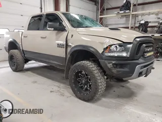 2017 Ram 1500 Rebel z VIN 1C6RR7YT1HS616365, wystawiony jako IAAI lot #41980267 z przebiegiem 121 435 mil mil oraz . Historia ofert i sprzedaży dostępna na DreamBid. Obrazek 1.