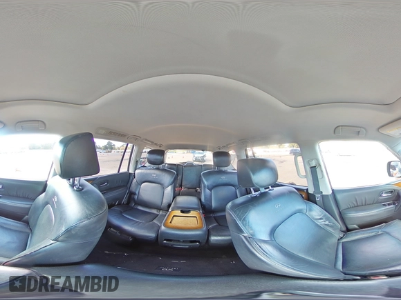 2012 Infiniti QX56 7-passenger with VIN JN8AZ2NF6C9518069, listed as a Copart auction lot 77857344 with 159,575 mi miles and Salvage Title. Bid and sale history available at carsss.com. Image 14.