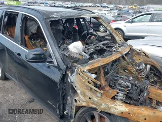 2016 BMW X5 xDrive40e with VIN 5UXKT0C55G0S75539, listed as a IAAI auction lot 41683390 with Not Provided miles and . Bid and sale history available at DreamBid. Image 11.