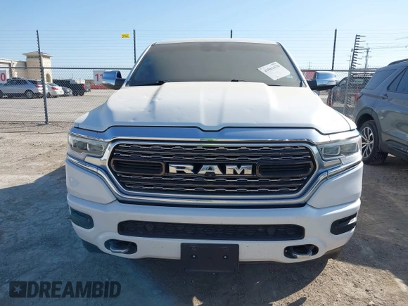 2020 Ram 1500 Limited with VIN 1C6SRFHT8LN190922, listed as a IAAI auction lot 41961670 with 120,100 mi miles and . Bid and sale history available at DreamBid. Image 12.