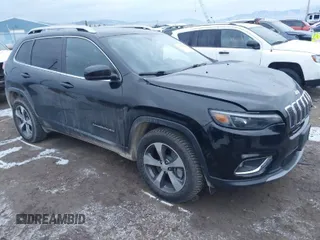 2019 Jeep Cherokee Limited with VIN 1C4PJMDX0KD218767, listed as a IAAI auction lot 41059122 with 72,341 mi miles. Bid and sale history available at carsss.com. Image 1.