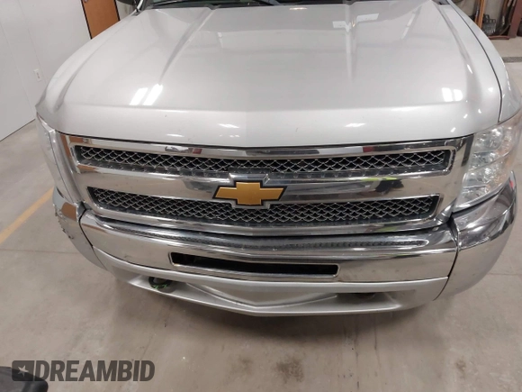 2013 Chevrolet Silverado 1500 LT with VIN 1GCRKSE73DZ328002, listed as a IAAI auction lot 41842745 with 124,496 mi miles and . Bid and sale history available at DreamBid. Image 12.