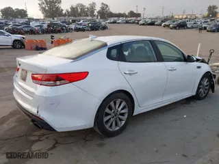 2016 Kia Optima LX with VIN 5XXGT4L34GG084299, listed as a IAAI auction lot 39779795 with 237,126 mi miles. Bid and sale history available at carsss.com. Image 4.