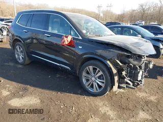 2023 Cadillac XT6 FWD Premium Luxury with VIN 1GYKPCRS1PZ105964, listed as a IAAI auction lot 41525039 with 70,603 mi miles. Bid and sale history available at carsss.com. Image 1.