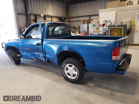1999 Dodge Dakota SLT with VIN 1B7FL26X0XS298131, listed as a Copart auction lot 69590254 with 162,606 mi miles and Salvage Title. Bid and sale history available at carsss.com. Image 2.