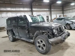 2018 Jeep Wrangler JK Unlimited Sahara with VIN 1C4HJWEG0JL918663, listed as a Copart auction lot 83179554 with 112,921 mi miles and Salvage Title. Bid and sale history available at carsss.com. Image 4.