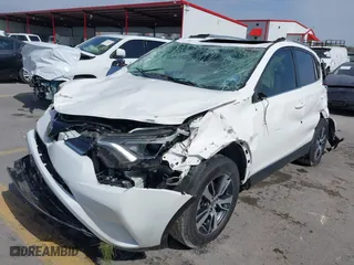 2018 Toyota RAV4 XLE with VIN JTMWFREV0JD132042, listed as a IAAI auction lot 41578567 with 102,365 mi miles. Bid and sale history available at carsss.com. Image 17.