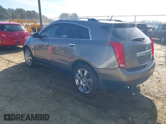 2012 Cadillac SRX Performance Collection with VIN 3GYFNBE3XCS565616, listed as a IAAI auction lot 41835476 with 141,259 mi miles. Bid and sale history available at carsss.com. Image 3.