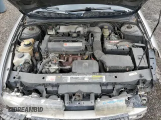 1999 Saturn SL with VIN 1G8ZK5271XZ174703, listed as a Copart auction lot 44570335 with 132,467 mi miles and Salvage Title. Bid and sale history available at carsss.com. Image 11.