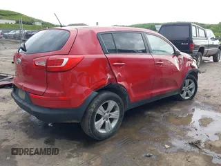 2012 Kia Sportage LX with VIN KNDPB3A23C7311640, listed as a IAAI auction lot 42258206 with 220,000 mi miles and . Bid and sale history available at DreamBid. Image 4.
