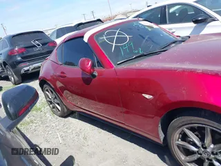 2021 Mazda MX-5 Miata Grand Touring с VIN JM1NDAM71M0459437, выставлен на аукционе IAAI как лот 41808704 с пробегом 19 368 миль миль и . История ставок и продаж доступна на DreamBid. Изображение 14.