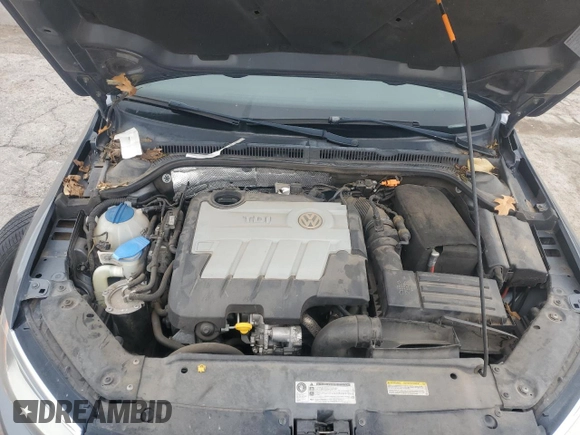 2014 Volkswagen Jetta TDI w/Premium/Nav z VIN 3VWLL7AJ1EM430822, wystawiony jako Copart lot #57405845 z przebiegiem 112 178 mil mil oraz Szkoda całkowita • Salvage title. Historia ofert i sprzedaży dostępna na DreamBid. Obrazek 11.