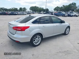 2015 Ford Focus SE with VIN 1FADP3F27FL215315, listed as a IAAI auction lot 42716234 with 118,645 mi miles and . Bid and sale history available at DreamBid. Image 4.
