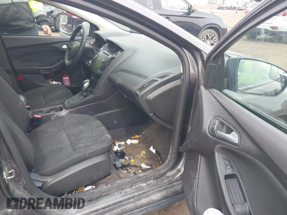 2015 Ford Focus SE with VIN 1FADP3K27FL303111, listed as a IAAI auction lot 41802182 with 195,834 mi miles and . Bid and sale history available at DreamBid. Image 5.