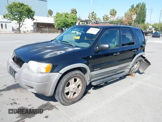 2002 Ford Escape XLT with VIN 1FMCU03142KC39723, listed as a IAAI auction lot 42228038 with 131,399 mi miles and . Bid and sale history available at DreamBid. Image 2.