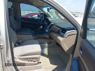 2015 Chevrolet Tahoe LS with VIN 1GNSCAKC9FR294832, listed as a IAAI auction lot 39274877 with 126,932 mi miles and . Bid and sale history available at DreamBid. Image 5.