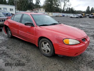 2000 Pontiac Grand Am SE1 with VIN 1G2NF52E9YM884376, listed as a Copart auction lot 86750694 with 106,097 mi miles and Salvage Title. Bid and sale history available at carsss.com. Image 4.