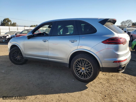 2018 Porsche Cayenne with VIN WP1AA2A21JKA05743, listed as a Copart auction lot 42643605 with 76,927 mi miles and Salvage Title. Bid and sale history available at carsss.com. Image 2.
