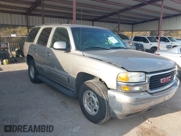 2003 GMC Yukon SLT with VIN 1GKEC13Z43R163266, listed as a IAAI auction lot 41540592 with 173,804 mi miles. Bid and sale history available at carsss.com. Image 1.