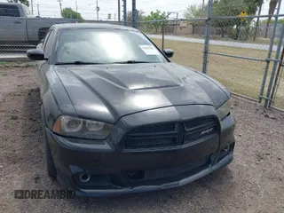 2012 Dodge Charger SRT8 with VIN 2C3CDXEJ7CH169853, listed as a IAAI auction lot 41857468 with 145,016 mi miles. Bid and sale history available at carsss.com. Image 1.