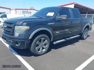 2013 Ford F-150 XL with VIN 1FTFW1ETXDKF25580, listed as a IAAI auction lot 41984341 with 256,014 mi miles. Bid and sale history available at carsss.com. Image 2.