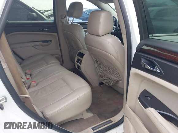 2013 Cadillac SRX Performance Collection z VIN 3GYFNDE38DS542736, wystawiony jako IAAI lot #42398648 z przebiegiem 266 059 mil mil oraz . Historia ofert i sprzedaży dostępna na DreamBid. Obrazek 8.