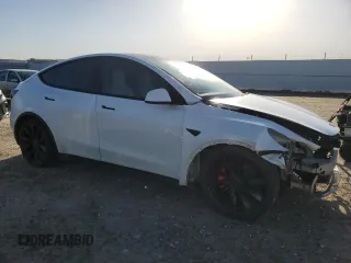 2020 Tesla Model Y Long Range with VIN 5YJYGDEFXLF034617, listed as a Copart auction lot 53235235 with 113,480 mi miles and Salvage Title. Bid and sale history available at DreamBid. Image 4.