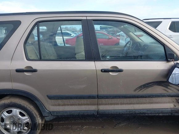 2006 Honda CR-V LX z VIN SHSRD78546U419783, wystawiony jako IAAI lot #41651042 z przebiegiem 162 131 mil mil oraz . Historia ofert i sprzedaży dostępna na DreamBid. Obrazek 13.
