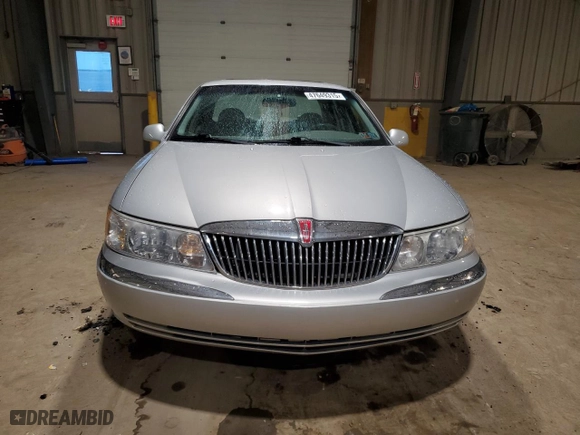 2001 Lincoln Continental with VIN 1LNHM97V51Y698794, listed as a Copart auction lot 47649315 with 84,465 mi miles and Salvage Title. Bid and sale history available at carsss.com. Image 5.