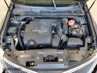 2013 Lincoln MKS with VIN 1LNHL9DK6DG613985, listed as a Copart auction lot 48672465 with 102218 miles and Salvage Title. Bid and sale history available at carsss.com. Image 11.