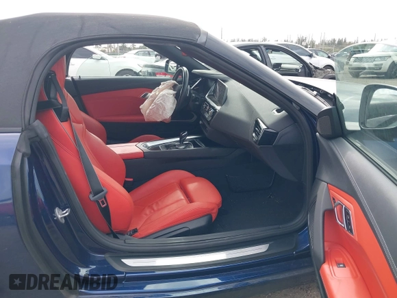 2021 BMW Z4 sDrive30i with VIN WBAHF3C05MWX11773, listed as a IAAI auction lot 41358869 with 16,373 mi miles. Bid and sale history available at carsss.com. Image 5.