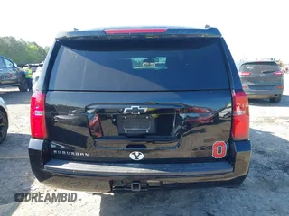 2019 Chevrolet Suburban LS with VIN 1GNSKGKC2KR353977, listed as a IAAI auction lot 42129814 with 85,454 mi miles and . Bid and sale history available at DreamBid. Image 16.
