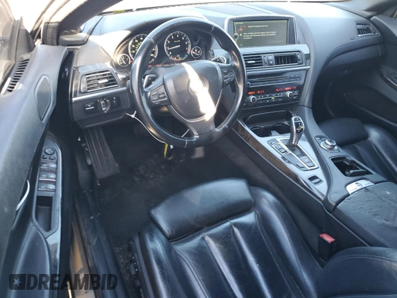 2012 BMW 6 Series 650i z VIN WBALZ3C51CDL72422, wystawiony jako Copart lot #87447914 z przebiegiem 115 376 mil mil oraz Szkody całkowita. Historia ofert i sprzedaży dostępna na DreamBid. Obrazek 8.