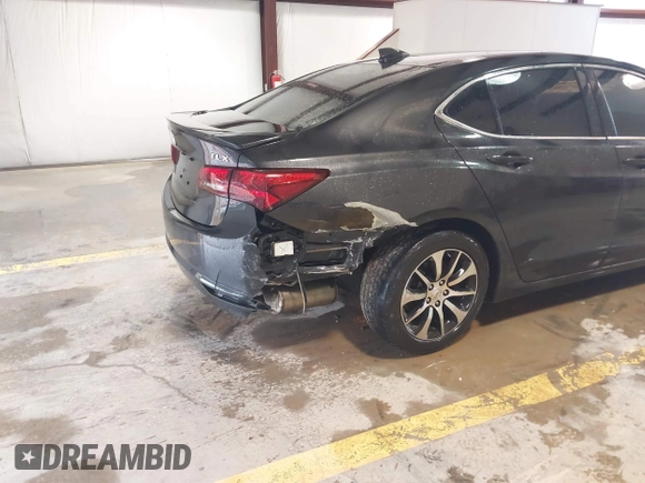 2015 Acura TLX Tech with VIN 19UUB1F5XFA003321, listed as a IAAI auction lot 41703980 with 102,227 mi miles. Bid and sale history available at carsss.com. Image 6.