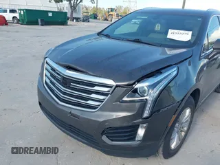 2019 Cadillac XT5 FWD with VIN 1GYKNARS5KZ143510, listed as a IAAI auction lot 41553279 with 53,943 mi miles and . Bid and sale history available at carsss.com. Image 6.