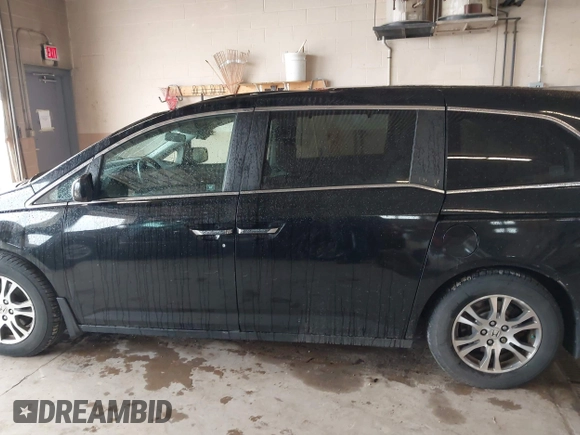 2012 Honda Odyssey EX z VIN 5FNRL5H4XCB017557, wystawiony jako IAAI lot #42367322 z przebiegiem 209 630 mil mil oraz . Historia ofert i sprzedaży dostępna na DreamBid. Obrazek 14.