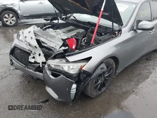 2015 Infiniti Q50 Premium with VIN JN1BV7APXFM358127, listed as a IAAI auction lot 42364173 with 97,512 mi miles and . Bid and sale history available at DreamBid. Image 6.