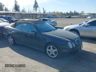 2003 Mercedes-Benz CLK 4.3L with VIN WDBLK70G13T144039, listed as a IAAI auction lot 42013311 with 121,440 mi miles. Bid and sale history available at carsss.com. Image 1.
