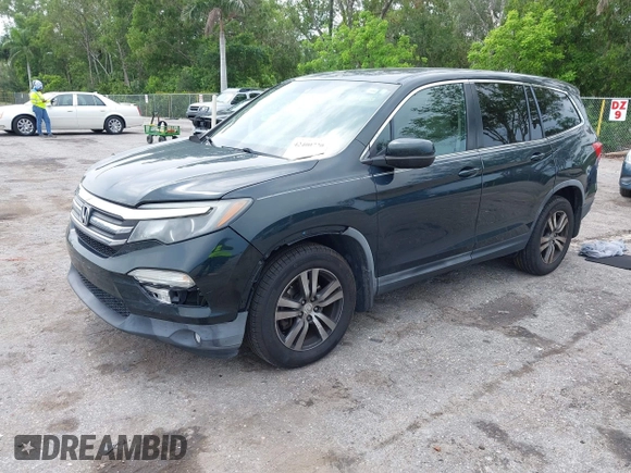 2017 Honda Pilot EX-L with VIN 5FNYF6H50HB033968, listed as a IAAI auction lot 42400720 with 119,597 mi miles and . Bid and sale history available at DreamBid. Image 2.