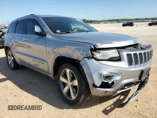 2014 Jeep Grand Cherokee Overland with VIN 1C4RJFCG7EC153156, listed as a Copart auction lot 52452925 with 152,348 mi miles and Salvage Title. Bid and sale history available at DreamBid. Image 4.