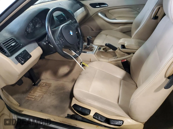 2002 BMW 3 Series 325Ci with VIN WBABN33472JW52750, listed as a Copart auction lot 79733074 with 188,991 mi miles and Salvage title. Bid and sale history available at DreamBid. Image 7.