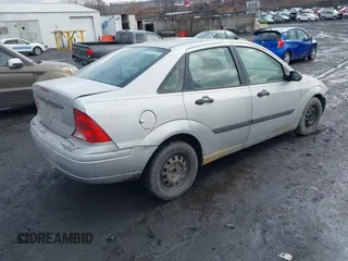 2001 Ford Focus LX with VIN 1FAFP33P31W297608, listed as a IAAI auction lot 41663965 with 142,898 mi miles and . Bid and sale history available at carsss.com. Image 4.
